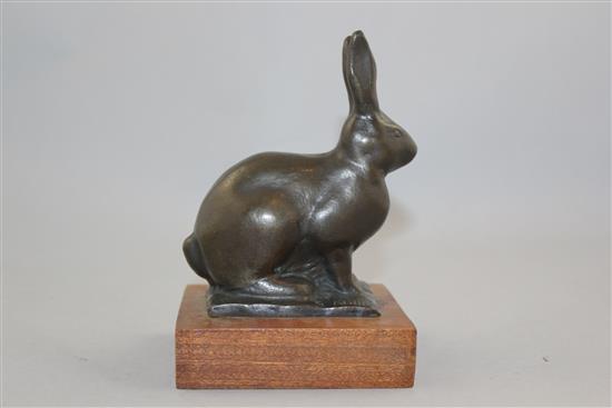 Gunnar Nilsson (Swedish, 1904-1995). A patinated bronze model of a seated hare, 6in.